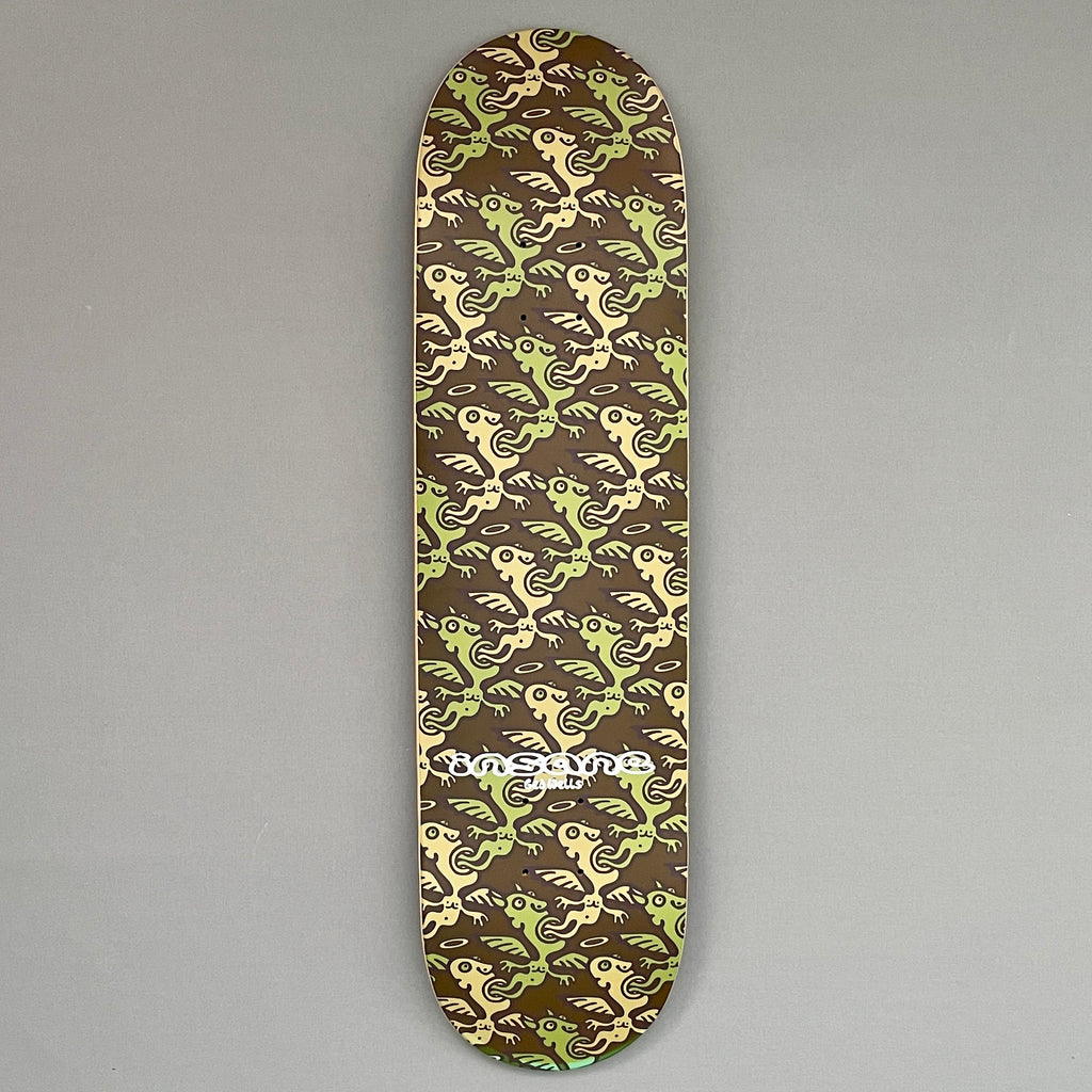 A skateboard deck featuring  Ged Wells repeat camouflage graphic of angels and devils 